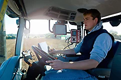 Young Man Driving Tractor