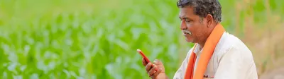 famrer mobile in hand