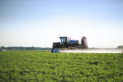 sprayer in field early spring