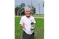 farmer holding Clincher 