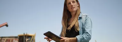 Woman with iPad in a Wheatfield